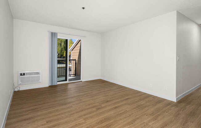 Living Room with Patio and Hard Surface Flooring