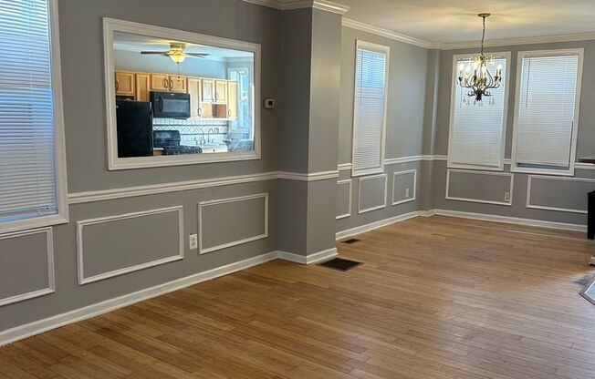 Spacious Home for Rent! Open Floor-Plan! Partially Finished Basement! Front Porch & Fenced in Yard! Available Now!