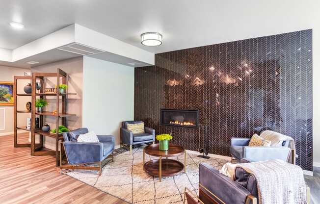Common area lounge with fireplace and seating