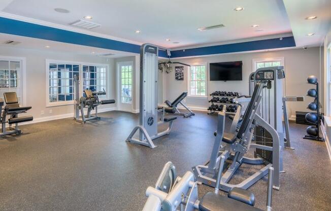 a gym with a lot of exercise equipment in it at Sterling Manor, Williamsburg Virginia