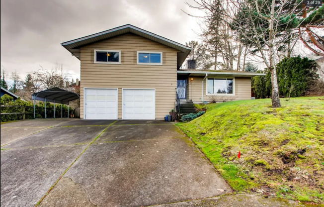 Great Split-Level Home Situated on a Large Lot and is Very Large Dog Friendly!