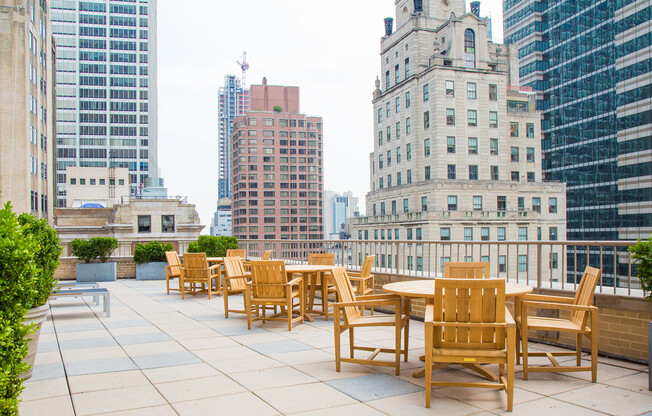 Rooftop terrace with outdoor dining space at 45 Wall Street Apartments. 