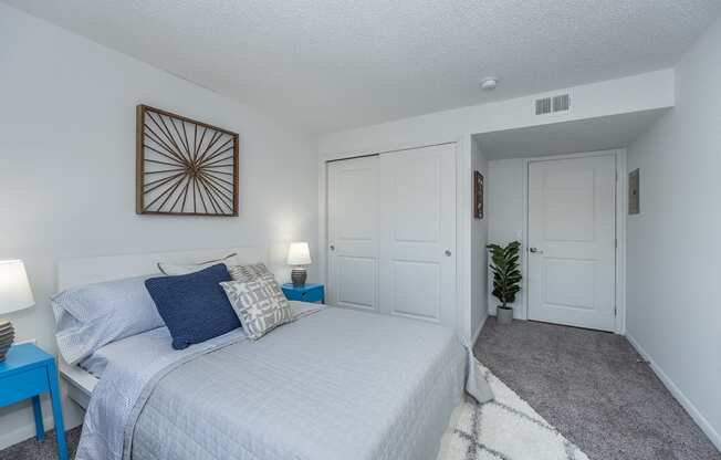 Bedroom with cozy bedat Mallard Landing Apartments , Marion, OH, 43302