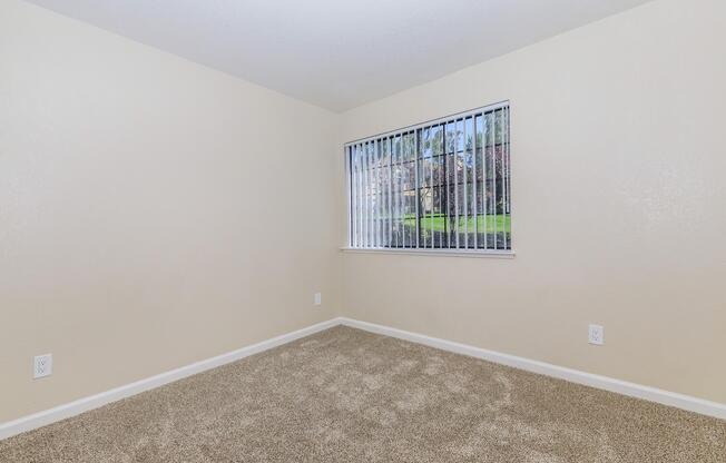 a bedroom with a large mirror