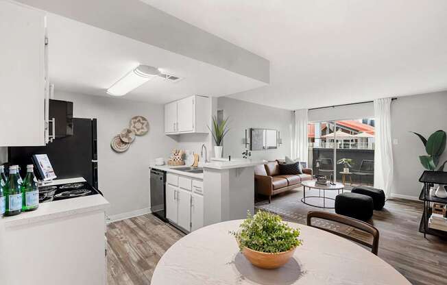 A modern kitchen with a dining table