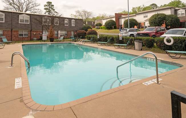 A small pool with a brownish tiled edge.
