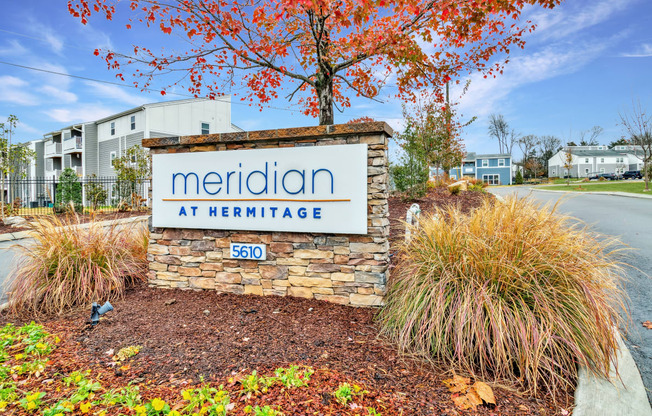 our sign at the entrance of our apartments at meridian at heritage sign