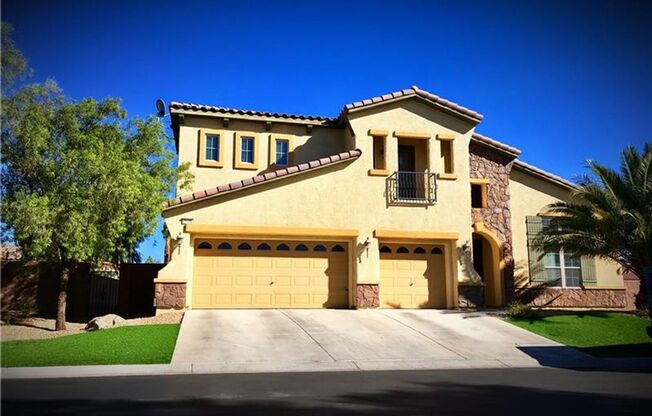 Stunning home on a HUGE corner lot, in a Northwest Las Vegas GATED COMMUNITY!