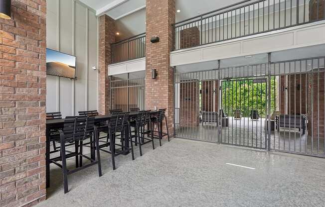 Outdoor seating and dining area with Flat-screen TVs