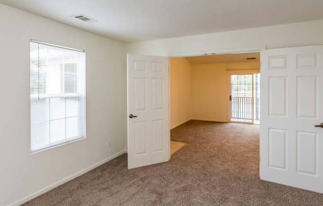 Spacious bedroom with French doors at Bexley Village, Indiana, 46143