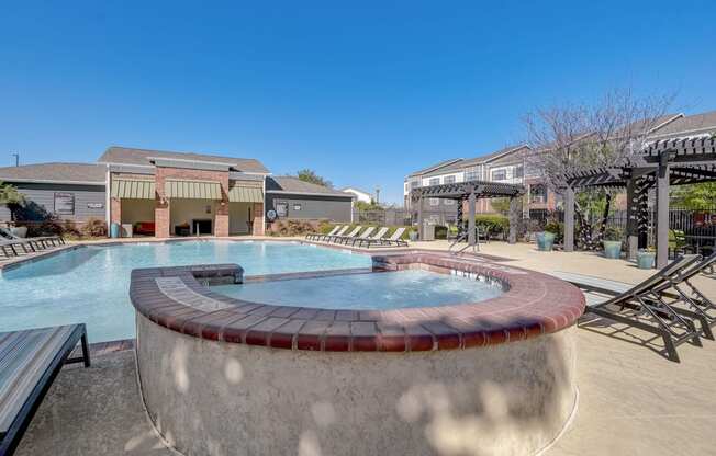 our apartments have a large swimming pool with chairs