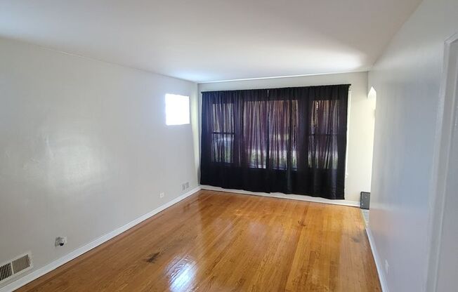 4 bed - 1 and 3/4 bath raised brick ranch with a finished basement in the West Pullman Area