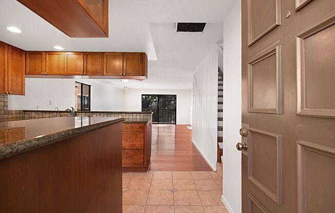 Rarely available Clairemont 3-story end unit townhome.