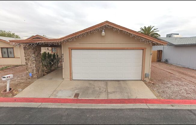 ADORABLE 2 BEDROOM 2 BATHROOM TOWNHOUSE WITH A 2 CAR GARAGE