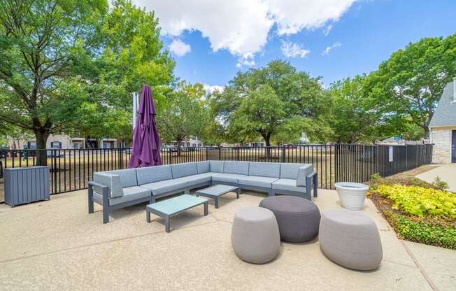 the reserve at bucklin hill leasing office patio with couches and tables