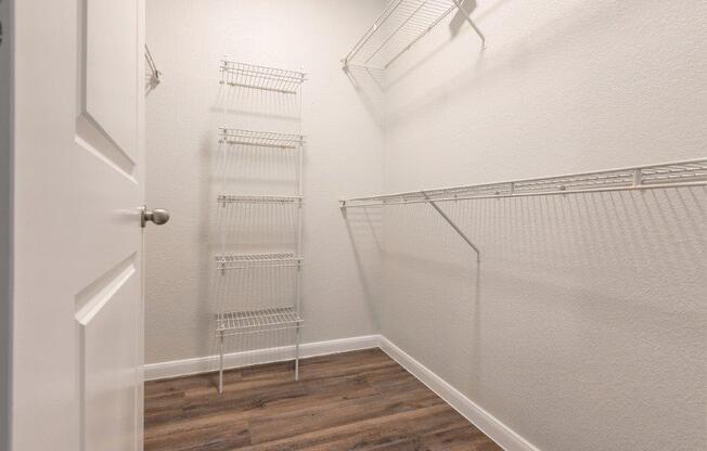 closet with shelving units