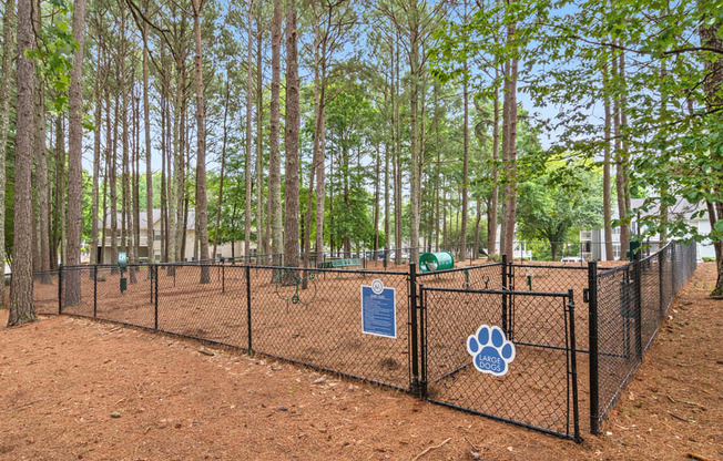 our apartments showcase a dog park with kennels