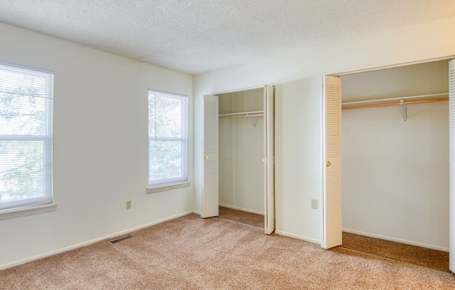 Large bedroom and closets at The Everett Apartments , Roanoke, VA 24018