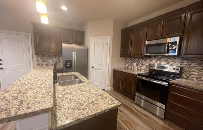 YOUR Dream Home is HERE! ~3 Bedroom 2.5 Bath ~ Full Size Washer/Dryer Connections Upstairs ~ Stainless Steel Kitchen Appliances ~ Custom Wood Cabinets ~ Ready for ASAP Move in!!! ~