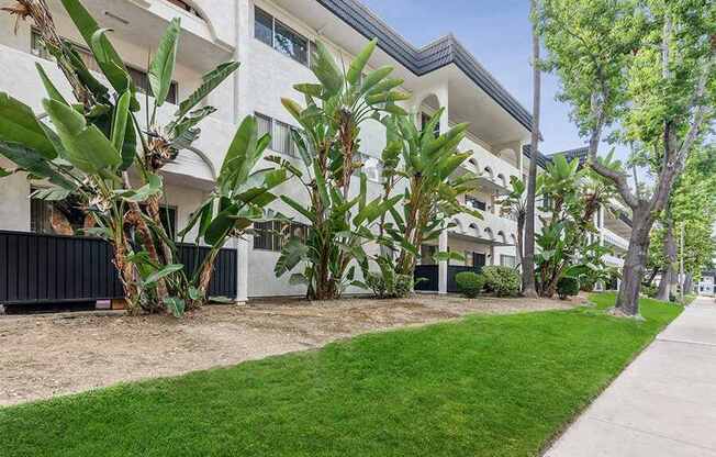 Exterior Community Building and Landscape at Palmilla Apartments located in San Diego, CA.
