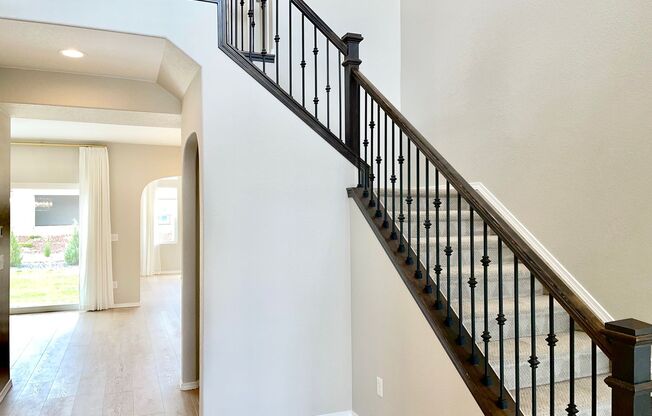 Built in 2021- Stunning 5 Bedroom 4 bath Home Nestled in Highline At Wolf Ranch