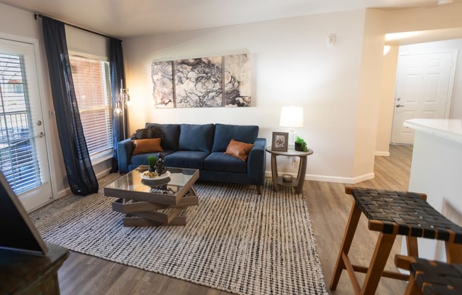 a living room with a couch and a coffee table