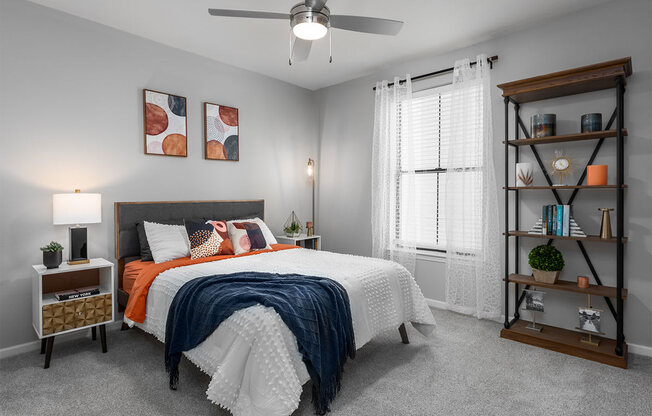 bedroom in top model home at the district at highland park apartments