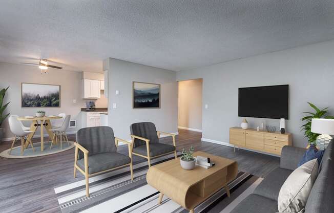 an open living room and dining room with a table and chairs