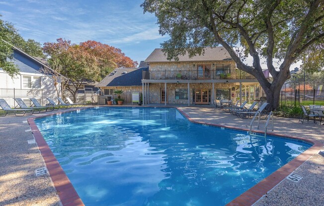 Experience luxury living at Distinction Apartment Homes. Enjoy a stunning pool surrounded by lush landscaping, perfect for relaxation and community gatherings. Elevate your lifestyle in a vibrant, welcoming environment. Schedule your tour today!