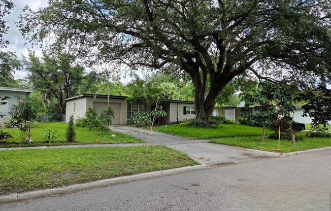 Charming 3-Bedroom Home with Spacious Backyard and One-Car Garage.