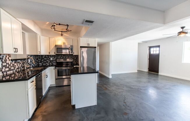 GORGEOUS, COMPLETELY REMODELED 5 BEDROOM, 3 BATH HOME WITH FULL GUEST HOUSE!