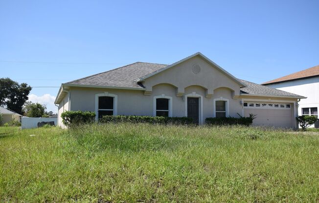 This charming 4 Bedroom, 2 Bath Single Family Home For Rent at 3785 Trade St. Deltona, FL 32738