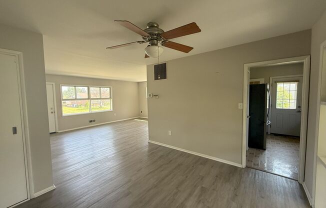 Charming Parkville Single Family Home with Sunroom & Private Backyard