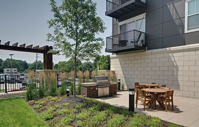 Garden Courtyard With Grills And Fireplace at Marq on Main, Lisle