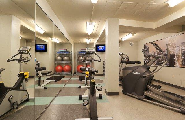 a gym with weights and other exercise equipment