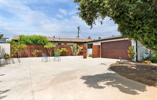 A Fully Furnished Modern Portfolio Home with a Large Backyard Oasis & 3 Comfortable Bedrooms!