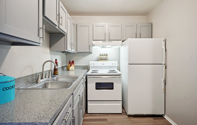 1 Bedroom - Remodeled Kitchen Area w/ Granite Countertops in Select Apartments