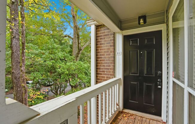 Bright Top-Floor Condo with Vaulted Ceilings & Balcony