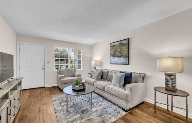 a living room with a couch and a table