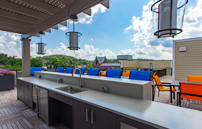 Rooftop mini bar with ample seating for entertaining