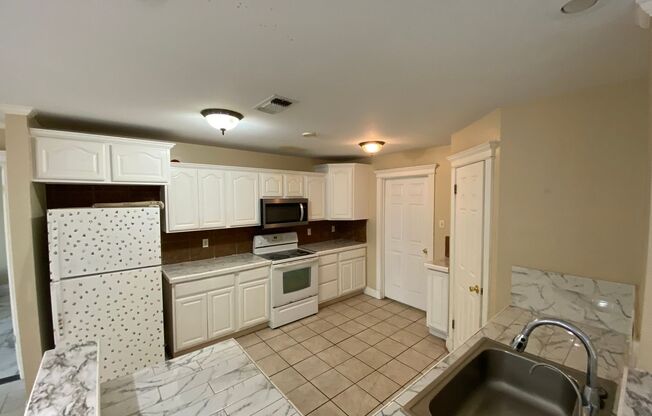 Discover your perfect 3 bedroom, 2 bath home in The Bluffs!
