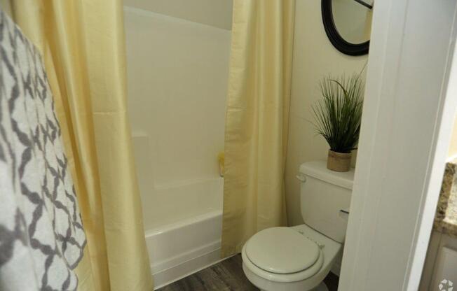 Large Soaking Tub With Tile Backslash at Citrus Gardens Apartments, Fontana, CA 92335