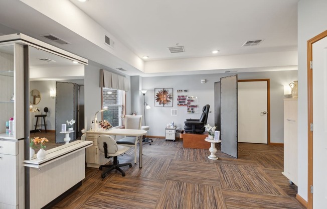 a dentist office with white walls and wood floors