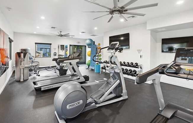 Community Fitness Center with Equipment at Ridgeline Apartments in Tucson, AZ.