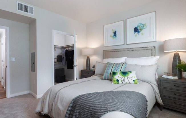 Two-Bedroom Apartments in Santa Clara, CA - Santana Terrace - Furnished Bedroom with Plush Carpet Flooring and a Large Closet