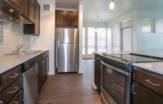 Kitchen with Stainless Steel Appliances and Granite Countertops
