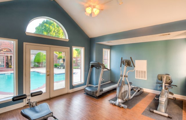 Gym with View of Pool