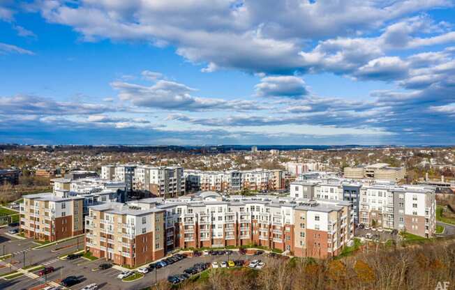 an aerial view of apartment buildings in a city