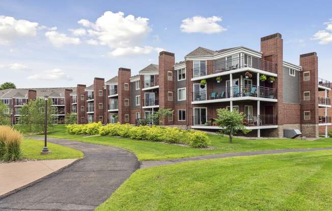 Lush Green Courtyard Wit Walking Paths at The Riverwood, Lilydale, MN, 55118