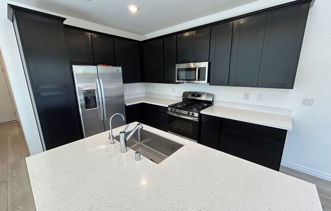Modern 4 Bed, 3 Bath Townhome with Updated Features